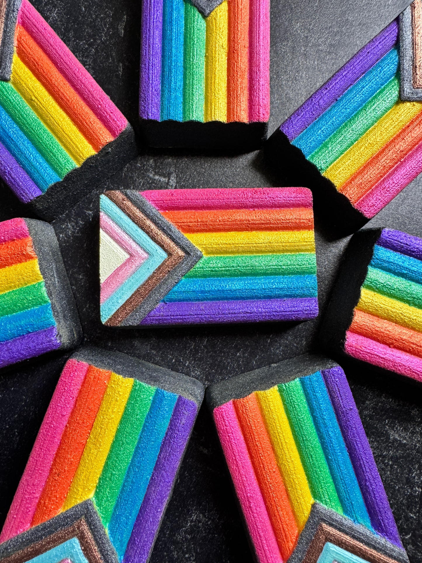 Colorful bath bomb with rainbow pattern